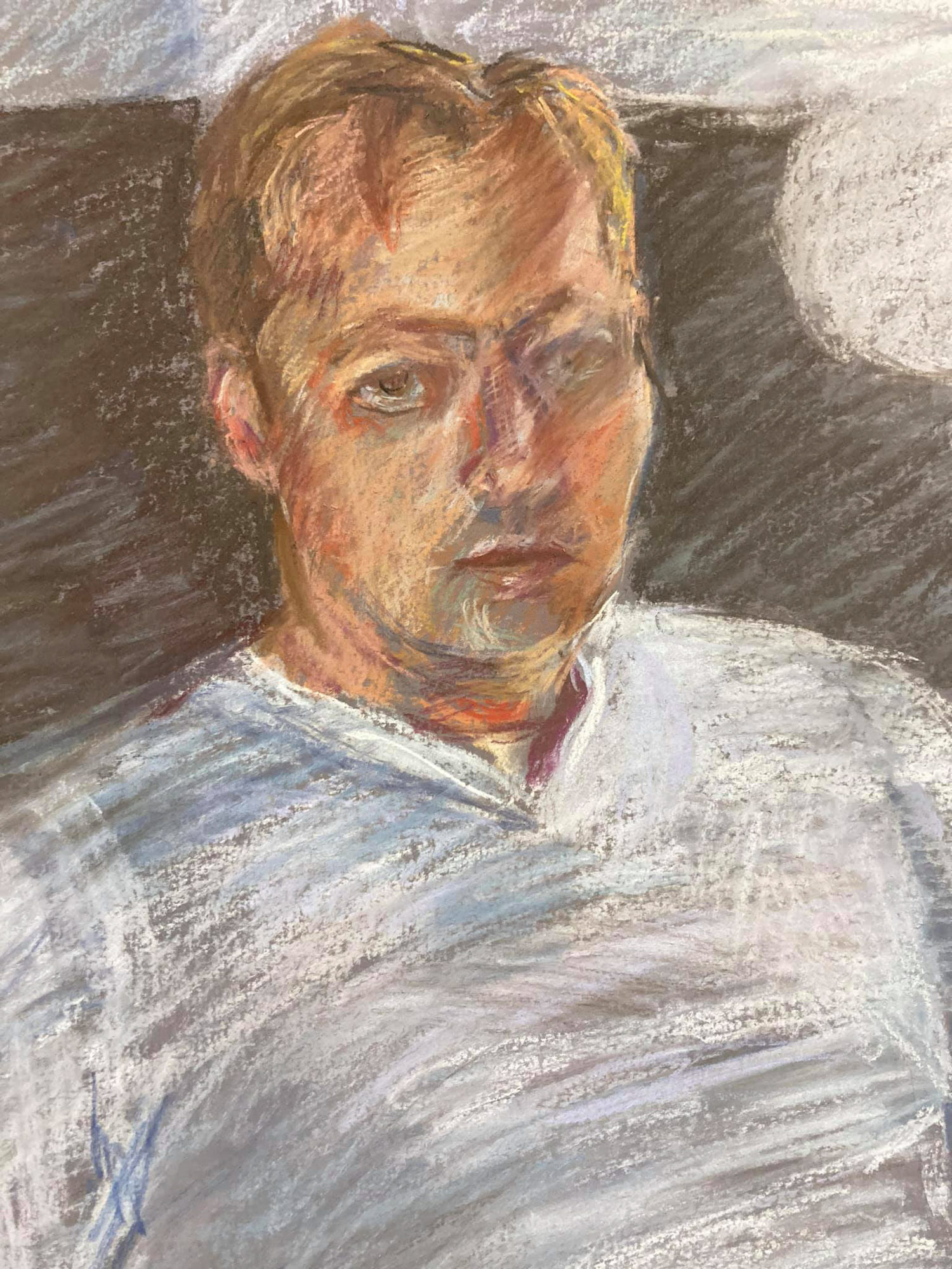 Pastel portrait study of Christopher Ryan in dramatic lighting