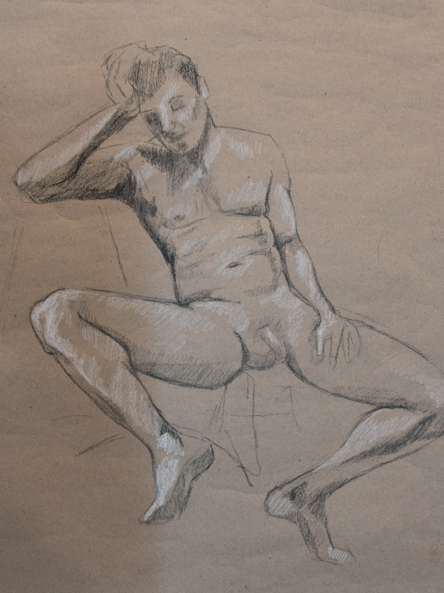 Charcoal figure study of Christopher Ryan on toned paper, crouching pose